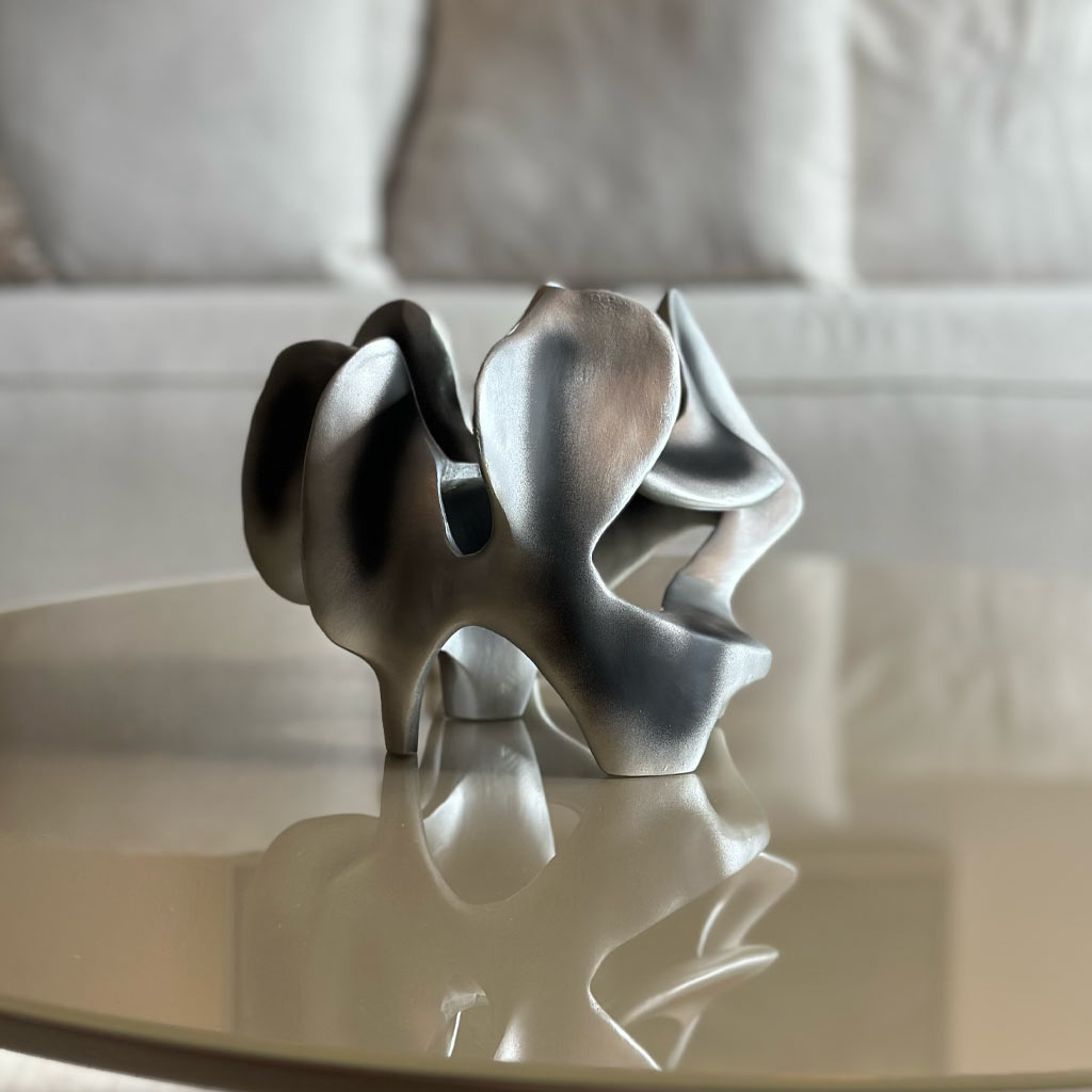 ESCULTURA VOID PLATA ENVEJECIDA