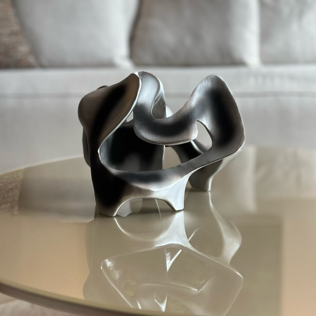 ESCULTURA VOID PLATA ENVEJECIDA